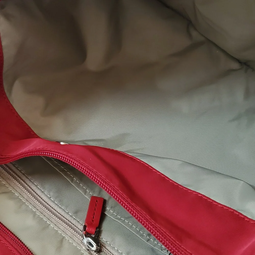 Tumi Pucket E/W Flap Crossbody Messenger Bag in Red with Silver Hardware